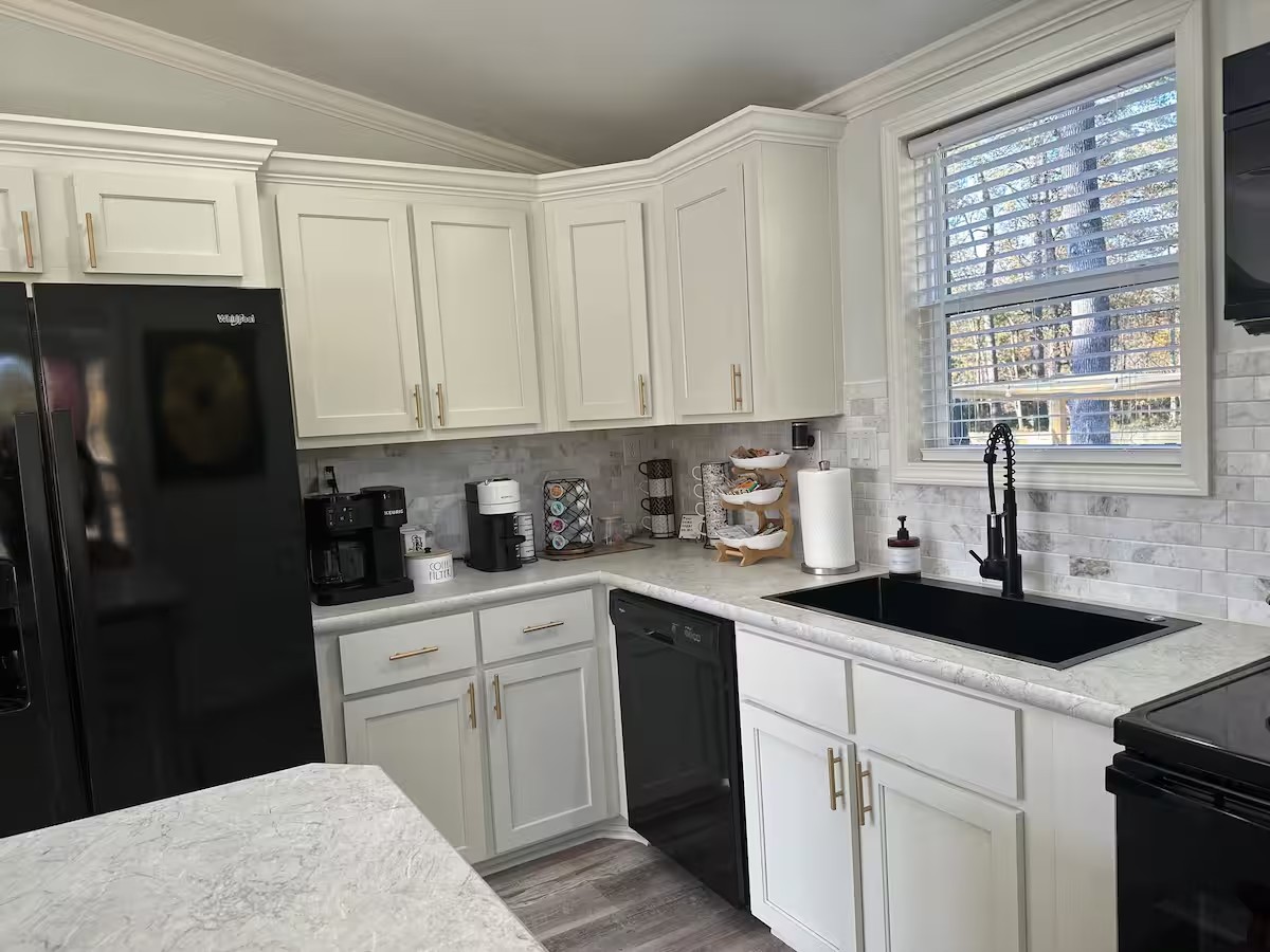 Kitchen with modern appliances and counter space