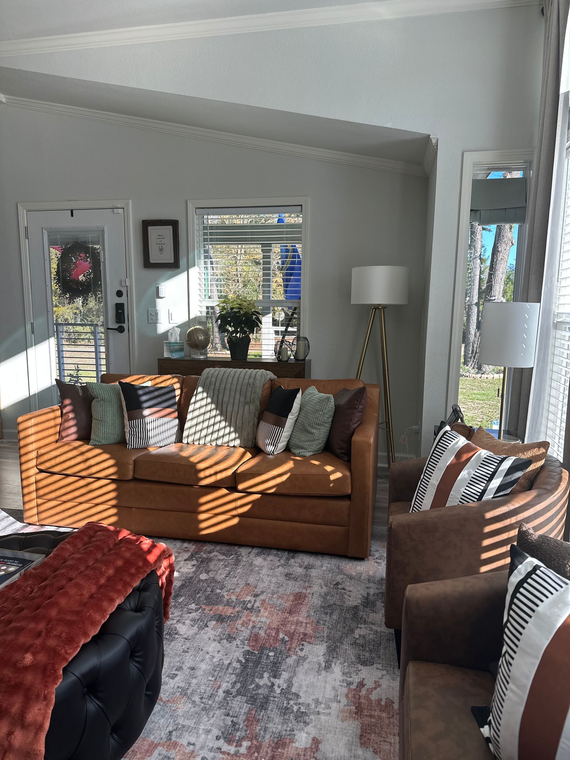Living room detail with board games and ceiling fan